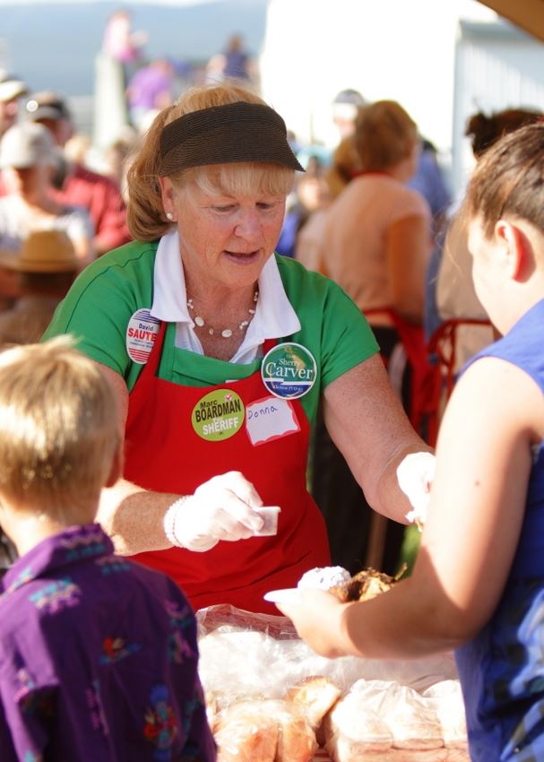 Members of the community serve food at the 2014 Klickitat County Fair.