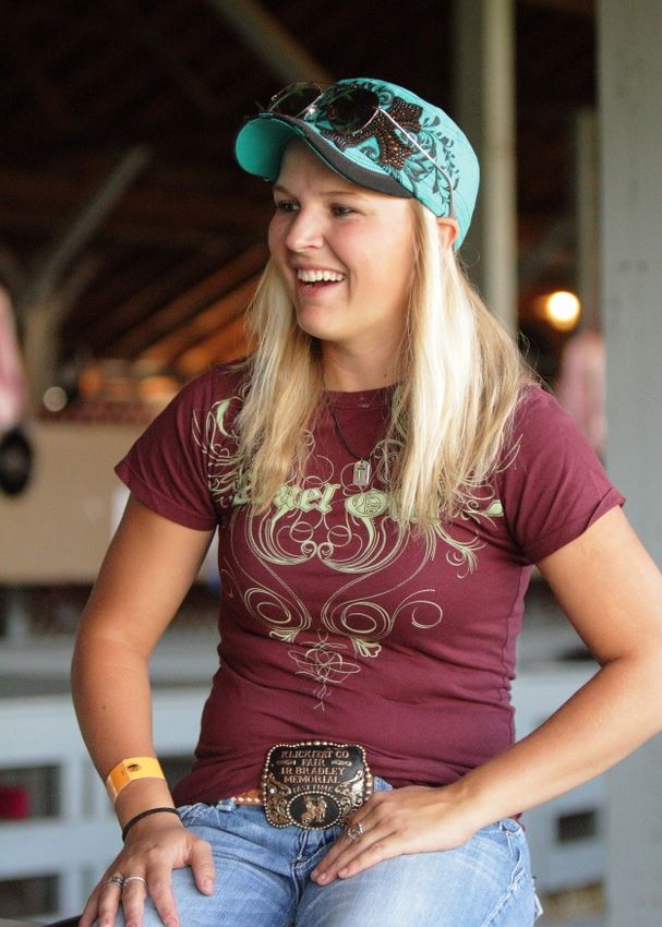 A girl sits at the 2014 Klickitat County Fair.