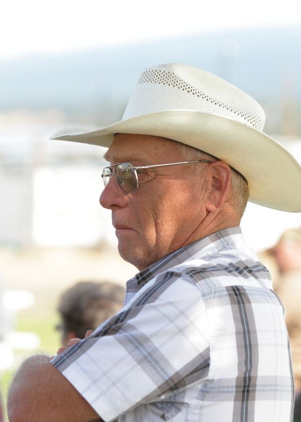 A gentleman wearing a cowboy hat observes the entertainment at the 2014 Klickitat County Fair.