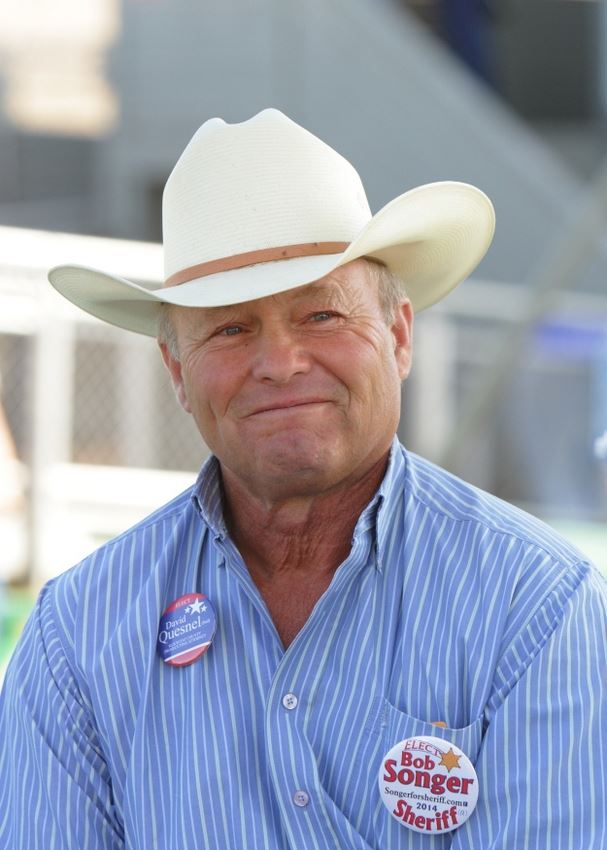 A man with a cowboy hat smiles at the 2014 Klickitat County Fair.