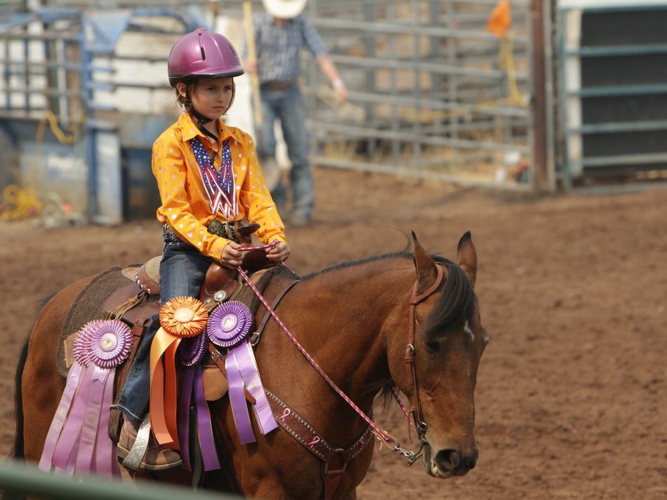 Little girl rides her horse during the 2015 Klickitat County Fair.