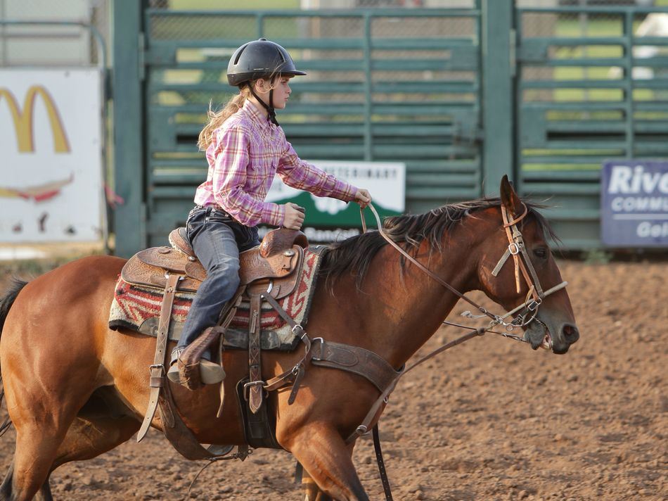 A girl performs on her horse at the 2015 Klickitat County Fair.