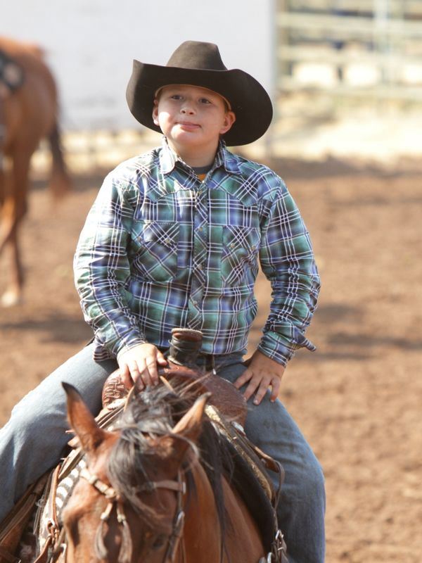A young man sits atop his horse at the 2015 Klickitat County Fair.