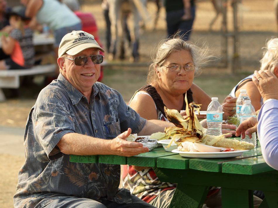 Members of the community enjoy food at the 2015 Klickitat County Fair.
