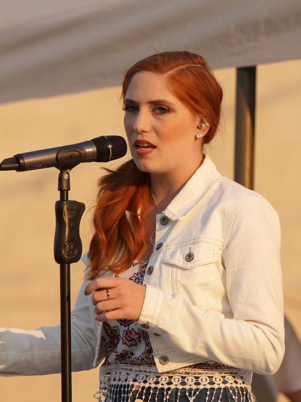 A young woman sings at the 2015 Klickitat County Fair.