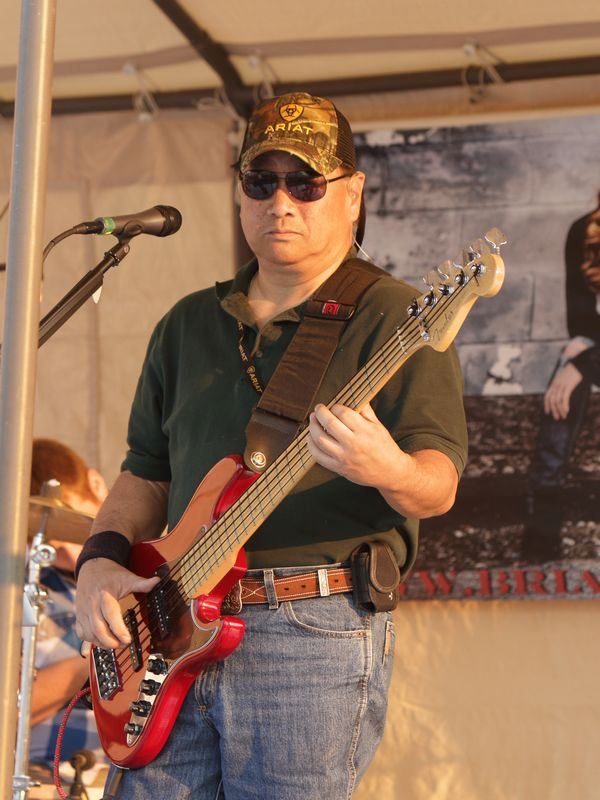 Man plays his bass guitar at the 2015 Klickitat County Fair.