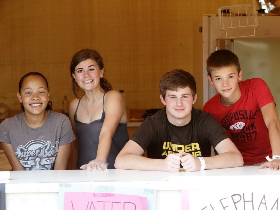 Teens sitting together at the 2015 Klickitat County Fair.
