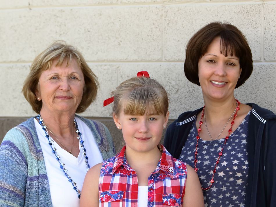 Two women and a young girl at the 2015 Klickitat County Fair.
