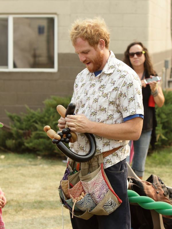 A man makes balloon animals at the 2015 Klickitat County Fair.