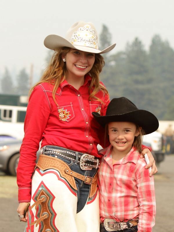 A woman and little girl stand together at the 2015 Klickitat County Fair.