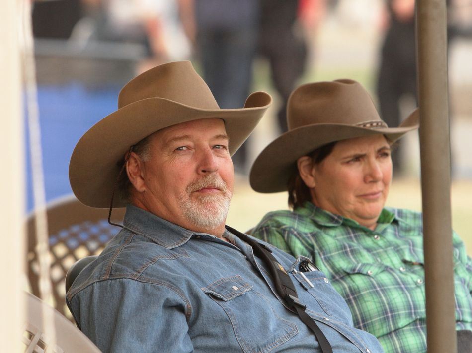 A man and woman sit together at the 2015 Klickitat County Fair.
