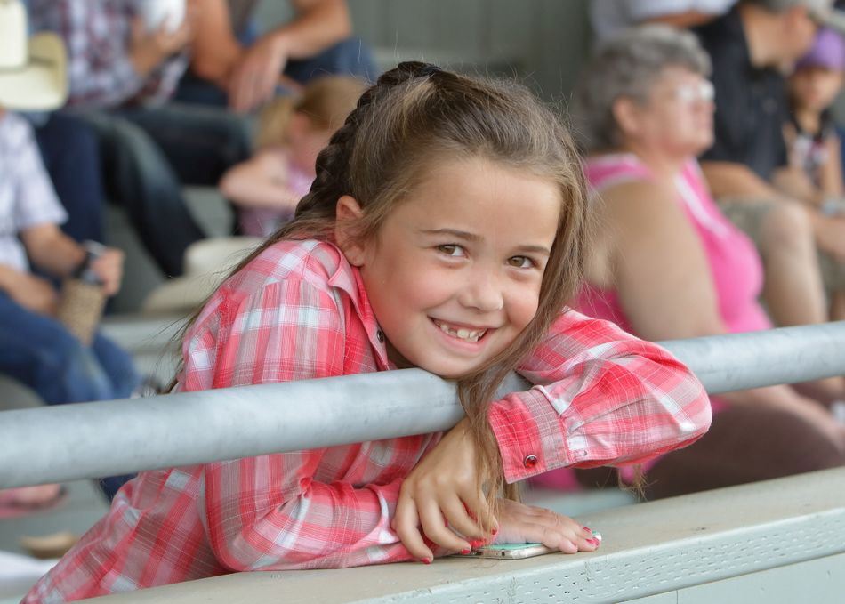 A girl smiles for the camera at the 2015 Klickitat County Fair.